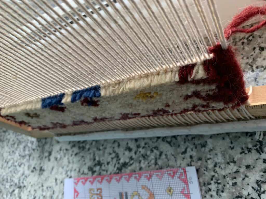 My first rug in progress. Warp and loom shown.