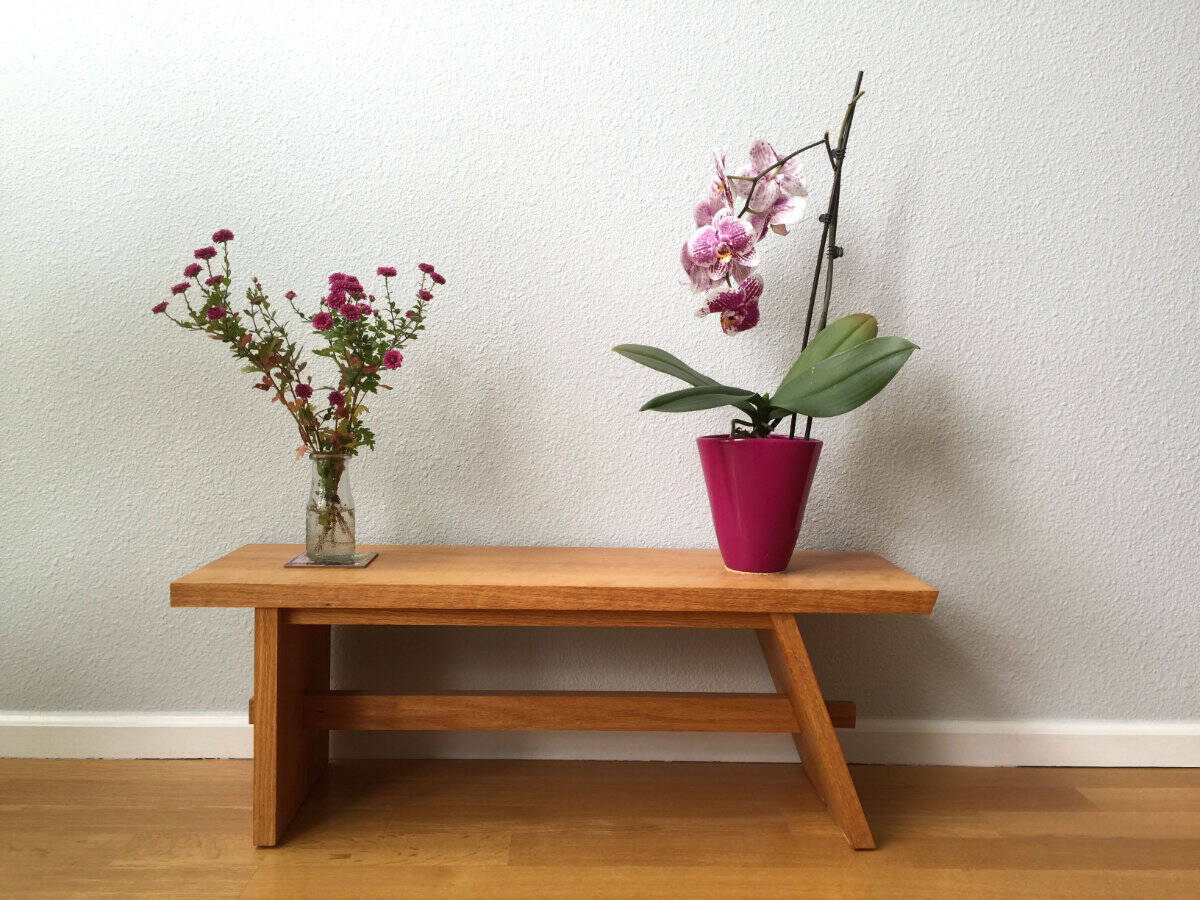 Handmade potting stool in red oak.